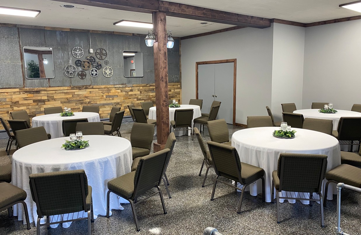 The Gray Pearl with white table cloths